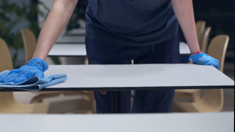 Cleaning table with blue cloth