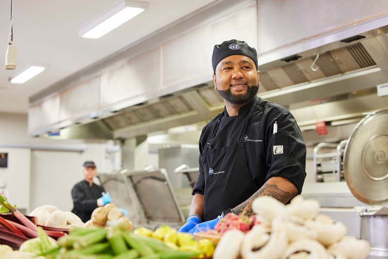 male chef preparing vegetables I&M 1